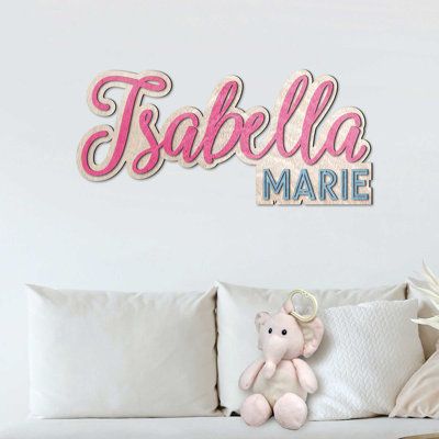 This personalized name sign is perfect for your child's nursery or bedroom. The sign is handcrafted from high-quality birch plywood and features a cut-out design of your baby's name. The sign can be left in its natural wood finish or painted to match the room's decor. It is a perfect gift for a baby shower or a new baby gift. The sign comes with mounting hardware making it easy to hang on any wall. This sign is not only a beautiful decorative piece, but it will also be a treasured keepsake that Contemporary Rustic Decor, Wicker Wall Decor, Big Wedding Cakes, Wicker Wall, Wooden Name Signs, Accent Wall Decor, Baby Name Signs, Nursery Name, Girl Bedroom