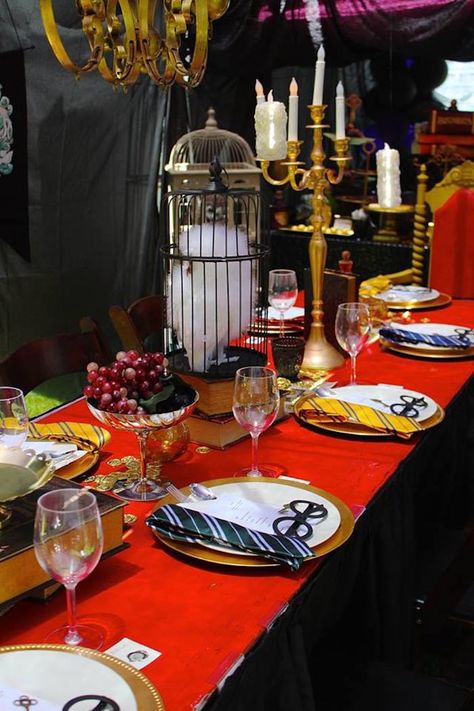 Party table from Gryffindor Harry Potter Birthday Party at Kara's Party Ideas. See over 50 pictures at karaspartyideas.com! Harry Potter Dining Table, Harry Potter Dining Hall, Harry Potter Party Ideas Decoration, Table Harry Potter, Harry Potter Table, Harry Potter Party Decorations, Hogwarts Party, Harry Potter Halloween Party, Cumpleaños Harry Potter