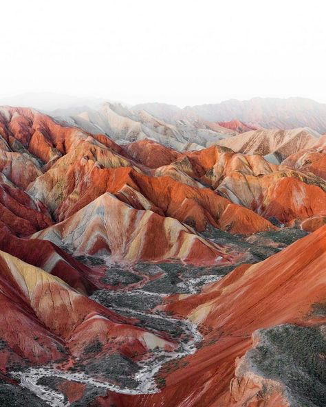 The rainbow mountains of China are a geological wonder of the world. The sand and silt was deposited with iron and trace minerals that provided it with the key ingredient to form the colors we see today. Arequipa, Mining Aesthetic, Rainbow Mountains China, Geology Aesthetic, China Mountains, Heart Mountain, Zhangye Danxia, Colors In Nature, Rainbow Mountains Peru