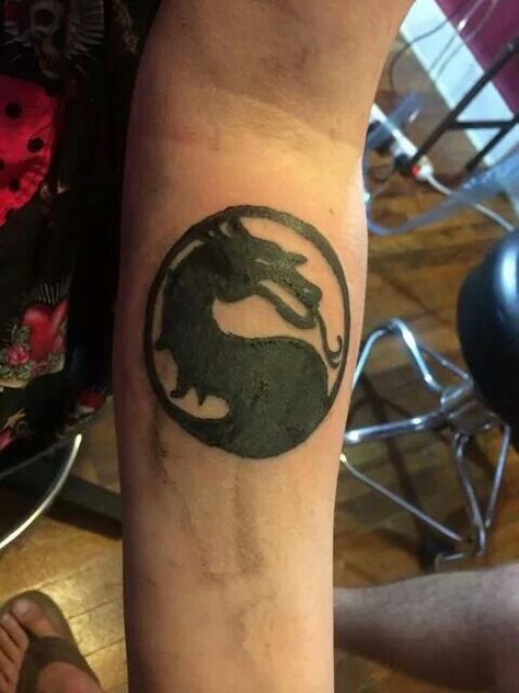 Mortal kombat tattoo #tattoos #mortalkombat #videogames Mortal Kombat, Leg Tattoos, Logos, Videogame Tattoo Ideas, Mortal Kombat Tattoo, Mortal Kombat X, Mortal Combat, Symbol Tattoos, Dope Art