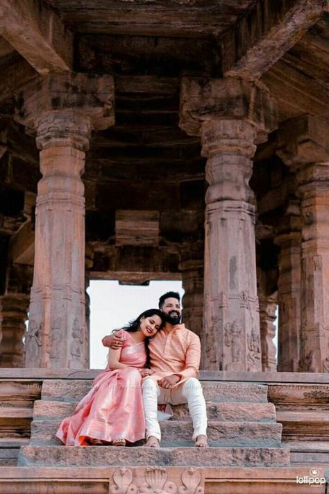 Introducing Best Pre-Wedding photoshoot ideas & themes that we have spotted for South Indian Couple. #weddingbazaar#indianwedding #preweddingphotoshoot #southindianprewedding #southindianpreweddingphotoshoot #southindianpreweddingshoot #southindianpreweddingphotoshootoutdoor #southindianpreweddingphotoshootposes #southindianpreweddingphotography #southindianpreweddingposes #southindianpreweddingshootposes #southindianpreweddingshootdresses #southindianpreweddingideas #southindianpreweddingunique Pre Wading Photo, Pre Wedding Shoot Ideas Indian Couple Photos In Saree, Traditional Look Couple Poses, Prewedding Photography Marathi, Traditional Couple Photoshoot In Temple, Couple Siting Pose, Temple Photography Couple, Pre Wedding In Saree, Traditional Temple Couple Photoshoot