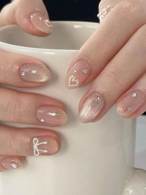 Korean bow nails: silver cat eye nails with a ribbon charm Nails Inspiration Asian, Very Short Nail Art Designs, Trending Korean Nails, Simple Nails Wedding Guest, Elegant Nail Inspiration, Trend Nail 2024, Korean Short Nails Ideas, Cute Nail Ideas Korean, Korean Nails Bow