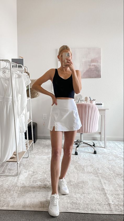 How to style a white tennis skirt for Summer! Sharing white tennis skirt outfit ideas that are perfect for playing tennis or pickleball, running errands, or walking your dog! Long Tennis Skirt Outfit, Tennis Black Skirt Outfit, White Tennis Skort Outfit, White Golf Skirt Outfit, Sport Skirt Outfit Casual, White Skort Outfit Ideas, Black Tennis Dress Outfit, White Tennis Skirt Outfit Ideas, White Athletic Skirt Outfit