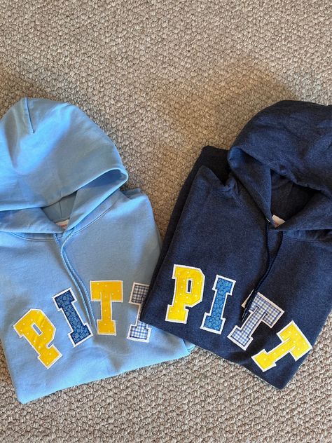 "What is this listing? This item is a custom college sweatshirt with appliqué made with gildan cotton hoodie blanks. Most colors are available, if not other brands are used.  In the personalization box please tell us your hoodie color along with exact text of what you want to spell out on it. Example: \"Light blue hoodie, \"Pitt\"\"  Hoodie colors: Light blue, navy, red, black, gray" Patchwork College Sweatshirt, Custom College Sweatshirt, Diy College Sweatshirt, Diy College Merch, Cute College Merch, Diy College Apparel, Appliqué Sweatshirt, College Merch, Hoodie Colors