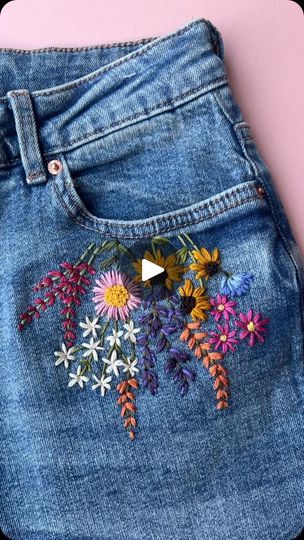 142K views · 10K reactions | Bold Blooms for spring! As you can see I’ve pulled the pocket out and inserted my embroidery hoop, this means the pocket is fully useable and it doesn’t get caught up in the stitches.

I’ve found that a 5 inch hoop fitted well 🌼
.
.
#upcycledclothing 
#upcycledfashion 
#embroideredflowers 
#embroideredclothing 
#embroidereddenim 
#embroideredclothes 
#embroideredflorals 
#learntoembroider 
#mindfulart 
#slowstitching 
#sewingproject 
#embroiderypatterns 
#bordadolivre 
#createdtocreate 
#diycrafts 
#slowcraft 
#dmcthreads 
#dmcembroidery 
#springflowers 
#embroiderydesign 
#beginnerembroidery 
#embroiderywork 
#denimembroidery 
#sustainablefashion 
#embroiderhappyhoops 
#embroiderytutorial 
#embroideryprocess 
#embroideryproject 
#handsew | Jenny ~ Embroidery Couture, Flower Embroidered Jeans, Denim Jacket Embroidery, Clothes Embroidery Diy, Flower Jeans, Denim Embroidery, Learning To Embroider, Embellished Clothing, Diy Embroidery Patterns