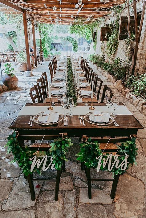Jess and Tom’s Boho Themed Destination Wedding in Cyprus by Christodoulou Photography Wedding Reception Seating Arrangement Layout, Table Setting Boho Wedding, Small Wedding Seating Ideas, Small Garden Wedding Decorations, Wedding Party Seating Ideas, Small Wedding Abroad, Small Patio Wedding Ideas, Boho Wedding Dinner Table, Boho Intimate Wedding