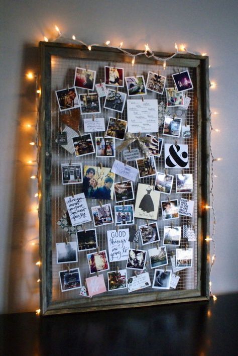 By removing the glass interior and adding wire, you can elevate an old frame into a beautifully crafted photo collage-esque display. Bonus: Add string lights around the frame to create a soft glow. Get the tutorial at Anastasia Co.   - CountryLiving.com Projek Kayu, Photo Collage Diy, Diy Dorm Decor, Diy Dekor, Dorm Diy, Old Picture Frames, Hemma Diy, Room Decor Diy, Decoration Photo