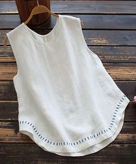 White Embroidered Tank - Women. Let yourself enjoy the warm-weather rays in this tank featuring embroidered details along the hem. Size note: This item runs small. Ordering one size up is recommended.Size M: 21.65'' long from high point of shoulder to hemPull-onWovenUnlined65% cotton / 35% polyesterMachine washImported Black Tank Top Women, Embroidered Hem, Tennis Tops, Retro Tops, Linen Tank, Casual Vest, Summer Tank, Casual Tank Tops, Summer Tank Tops