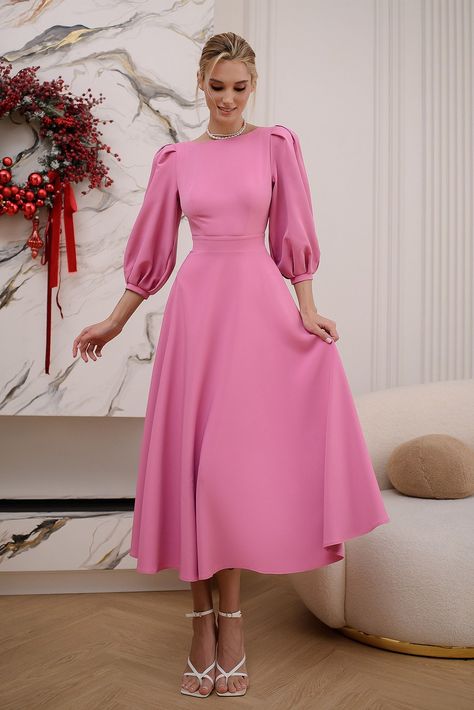 Radiate charm in the Dusty-Pink Backless Puff Sleeve Midi Dress from ELAGIA. The delicate hue, paired with a backless design and puff sleeves, creates an enchanting ensemble perfect for elegant occasions. #dustypinkdress #backlessdress #puffsleeves #enchantingstyle #elegantwear #womensfashion #dresslove #femininechic Couture, Pink Satin Puff Sleeve Dress, Dress Wedding Pink, Pair Pink With, Midi Long Sleeve Dress Formal, Puff Sleeves Dress Outfit, Christian Dressing, Dress Models For Women, Pink Dresses Long
