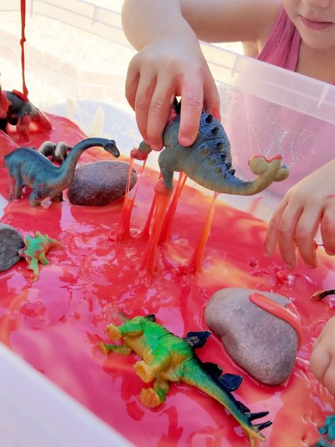 Lava Slime for your Preschool Dinosaur Theme - Dinosaur Sensory Activities Preschool, Dinosaur Themed Sensory Play, Preschool Fossil Activities, Dinosaur Preschool Science Activities, Learning About Dinosaurs Preschool, Classroom Dinosaur Theme, Prek Dinosaur Theme, Dinosaur Theme Preschool Crafts, Infant Dinosaur Activities