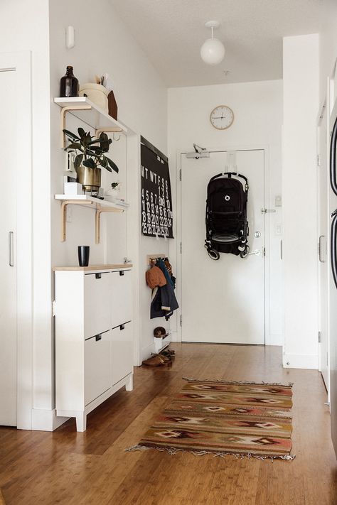 A 600-Square-Foot Vancouver Family Home. Like the shelves and brackets and use of IKEA spice racks. Small Entryways, Home Entrance Organization, Make An Entryway When You Don't Have One, Slim Entryway Ideas, Hallway 2023, Ideas For Small Apartments, Små Rum Lidt Plads, Vstupná Hala, Apartment Entryway