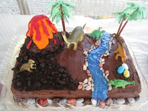 Dinosaur Cake!-rice crispies for rocks along stream. oreo crumbles. cupcake or bought volcano cake w melted candies. Volcano Birthday Party, Volcano Birthday, Volcano Cake, Dino Cake, Dinosaur Birthday Cakes, Dino Birthday Party, Dinosaur Cake, Dino Birthday, Dinosaur Birthday Party