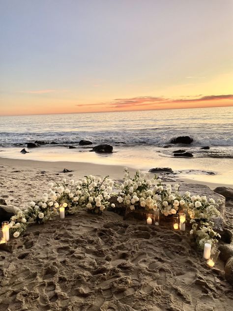 beach proposal, flowers on beach, beach engagement, beach proposal  ideas, beach proposal set up, beach sunset, coastal wedding, beach wedding, roses on beach, Proposal Sunset Ideas, Lake Doc Proposal, Beach Sunrise Proposal, Wedding Proposals On The Beach, Rose Beach Proposal, Fall Beach Proposal, Married On The Beach, Flowers In Sand Proposal, Beach Flower Wedding