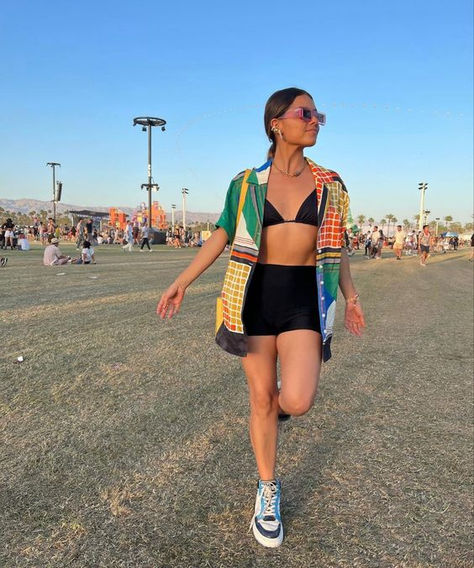 festival woman in black skirt bikini top and oversized shirt De Stijl, Festival Outfit With Converse, Functional Festival Outfits, Casual Edm Concert Outfit, Truck Festival Outfit, Sylvan Esso Concert Outfit, Casual Summer Festival Outfit, Biker Short Festival Outfit, Dnb Festival Outfits