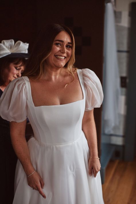 Smiling happy bride in a puff sleeve Suzanne Neville wedding dress. Bridgerton inspired bride. The Springles Photography. Wedding Dresses With Puffy Sleeves, Morning Wedding Dress, Bridgerton Style Wedding, Colour Wedding Dress, Wedding Dresses Sheer Sleeves, Cowley Manor, Hailey Wedding, Suzanne Neville Wedding Dress, Glamorous Curls