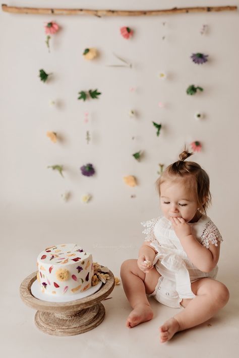 First Birthday Flower Photoshoot, Timeless First Birthday Photo, Bundt Smash Cake, 1st Birthday Flower Theme Photoshoot, Wildflower First Birthday Backdrop, Wild Flower Baby Birthday, Flowery First Birthday, Flower First Birthday Photoshoot, Wild Flower First Birthday Photoshoot