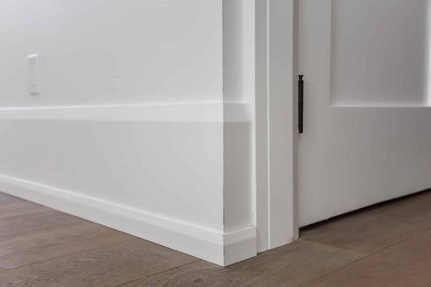 Base Molding Ideas Trim, Ranch Style Baseboards, Baseboard Meets Door Trim, Modern Traditional Door Trim, Baseboard Door Trim, Minimalist Baseboard Trim, Modern Farmhouse Millwork, Flat Trim Moldings, Transitional Molding Ideas