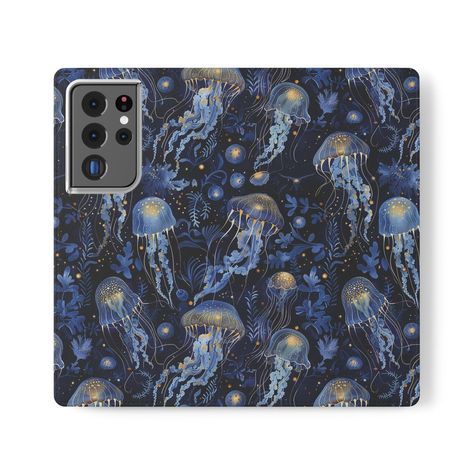 Protect your Samsung Galaxy S21 or S22 with this stunning jellyfish-themed flip folio case. Featuring a captivating underwater sea life design, this folio case not only safeguards your phone from everyday bumps and scratches but also includes card slots for added convenience. The jellyfish print in deep blue and gold gives it a unique ocean-inspired aesthetic, perfect for marine life enthusiasts. Designed exclusively for Samsung Galaxy S21 and S22 models, this case combines style and practicalit