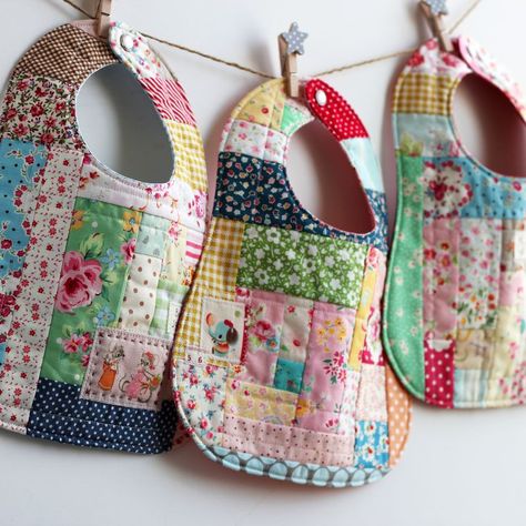 three scrap-happy bibs by nanaCompany Patchwork Log Cabin, Goodnight Moon, Sewing To Sell, Scrap Fabric Projects, Bib Pattern, Baby Sewing Projects, Quilt Baby, Beginner Sewing Projects Easy, Baby Projects