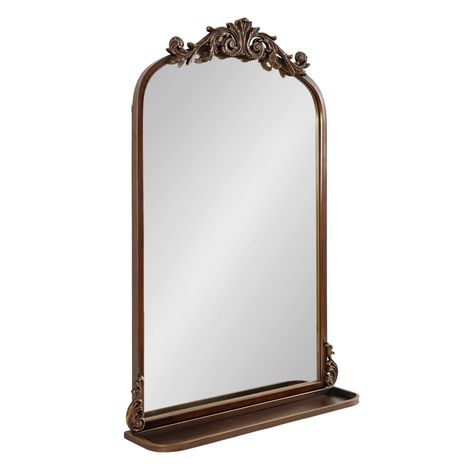 The Arendahl wall mirror brings a brilliant and decadent accent to any traditional home design. This wall mirror features a baroque-inspired design, with a resin garland crown cascading down an arched iron frame. Functional Shelf, Traditional Home Design, Traditional Glam, Arched Mirror, Keyhole Hanger, Mirror Store, Large Wall Mirror, Arch Mirror, Mirror With Shelf
