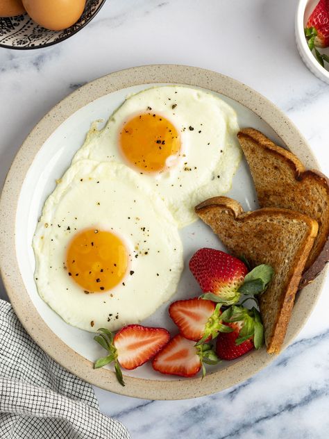 Sunny Side Up Eggs - Once Upon a Chef How To Cook Fried Eggs, Egg Sunny Side Up, Sunny Side Up, Sunny Side Up Eggs, Sunnyside Up Eggs, Fresh Strawberry Cake, Once Upon A Chef, Over Easy Eggs, Brunch Bread