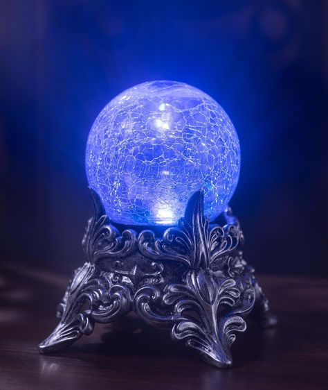 PRICES MAY VARY. 7.5" tall crystal ball decoration Glass ball features a unique cracked glass appearance with morphing color changing lights Ball is attached to stand. Uses 3 AAA batteries (included) Perfect for any Halloween scene or display Great for use as a theater prop Crystal Ball Decoration, Morphing Art, Magic Glasses, Witch Crystal Ball, Crystal Ball Stand, Divination Witch, Halloween Scene, Harry Potter Room, Lights Home