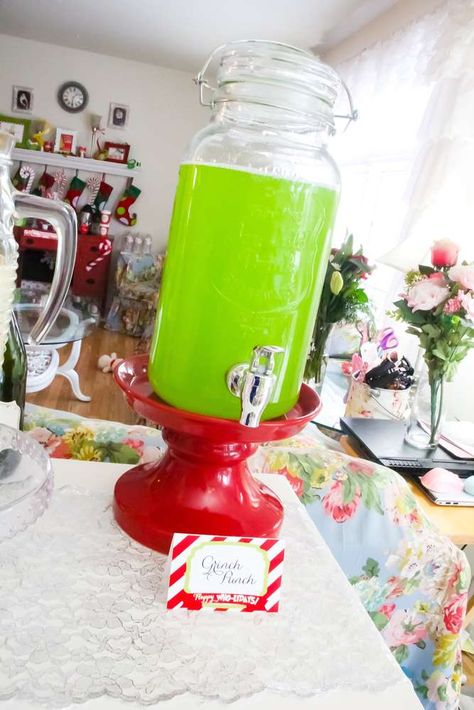 Christmas Themed Party Decorations, You’re A Mean One Birthday Party Grinch, Christmas Birthday Party Centerpieces, Grinch 1st Birthday Smash Cake, Grinch Two Year Old Birthday Party, Christmas Grinch Theme, Christmas Themed 2nd Birthday Party, Mr Grinch Birthday Party, Grinch Slumber Party