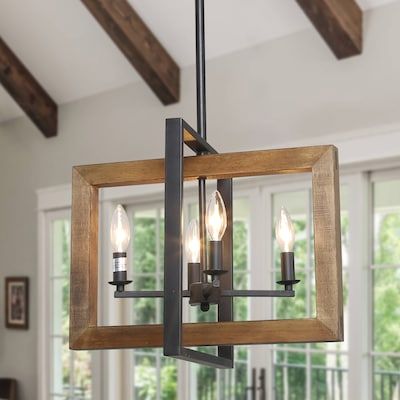 Shop LNC Titus 4-Light Sand Black and Brown Wood Farmhouse LED Chandelierundefined at Lowe's.com. The LNC home 4-light modern farmhouse matte black and brown wood grain handcrafted wooden chandelier lighting fixture is a perfect choice for your foyers, Wood And Metal Chandelier, Wood Chandelier Rustic, Candlestick Chandelier, Foyer Light, Lighting Fixtures Kitchen Island, Candelabra Chandeliers, Kitchen Island Chandelier, Wooden Chandelier, Farmhouse Pendant Lighting