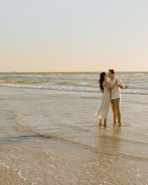 A very windy day turned into one of my fave engagement shoots 💍🌬️ Eric + Abby have the sweetest love and I am so happy I got to document this time for them!! Also isn’t her dress incredible!? There’s something about simplicity that is so elegant!! ✨ [beach engagement, engagement photos, St Pete beach photographer, st Pete photographer, Florida wedding photographer, beach engagement photos, documentary style photos, documentary photography] Beach Engagement Photos Poses, Fall Beach Engagement Photos, Wedding Photoshoot Beach, Engagement Shoot Beach, Engaged Photos, Documentary Engagement Photos, Florida Engagement Photos, Engagement Photo Shoot Beach, Proposal Shoot