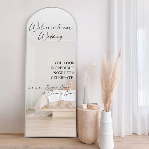 Welcome to our Wedding, you look Incredible Vinyl Decal for Wedding Mirror. Transform your wedding mirror into a stunning focal point with our custom vinyl decal. This elegant script will greet your guests with warmth and set the perfect tone for your special day. Personalized Elegance: Make your celebration uniquely yours by customizing this decal with your name. The delicate script adds a touch of sophistication, creating a memorable entrance for everyone. Mirror Magic: This decal is designed Wedding Mirror You Look Great, Wedding Selfie Mirror Sign, Welcome To Our Wedding Sign On Mirror, You Look Great Wedding Mirror, Wedding Decals Vinyl Lettering, Diy Mirror For Wedding, Tall Mirror Wedding Sign, Mirror Sayings For Wedding, Welcome Mirrors For Weddings