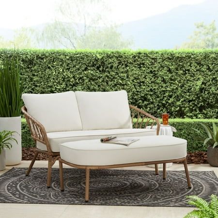 The Better Homes & Gardens Willow Sage All-Weather Wicker Outdoor Loveseat and Ottoman Set, Beige is a comfortable seating option that is perfect alone for smaller outdoor spaces or paired with other outdoor furniture as part of a larger seating arrangement. The comfy cushions are made with fade-resistant and stain-repellent fabric so you can have your drink with you without worrying about possible spills. The set is designed to last against the elements with fade-resistant fabric and sturdy steel frames that are e-coated and powder coated for rust resistance. Put your feet up and relax outdoors with the Better Homes & Gardens Willow Sage All-Weather Wicker Outdoor Loveseat Chair and Ottoman Set. Color: Brown. Small Patio Spaces, Small Patio Furniture, Willow And Sage, Outdoor Sectional Furniture, Patio Sofa Set, Patio Loveseat, Outdoor Loveseat, Balcony Furniture, Chair And Ottoman Set