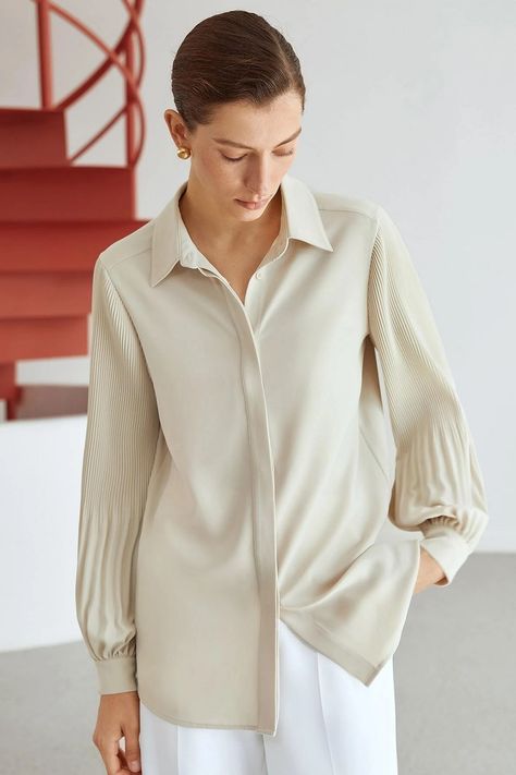 Women pleated long sleeve shirt is made of soft and comfortable fabric. This blouse shirt uses a button down, collar, long sleeve and a unique pleated design, nice to pair pants, jeans, skirts. #shirt #pleated #women Ladies Shirts Formal, Pleated Shirt, Sleeves Ideas, Pleated Sleeves, Beige Style, Top Outfit, Pleated Blouse, Jeans Skirts, Trending Fashion