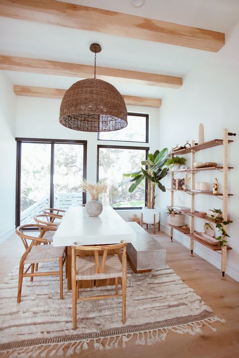 Minimalistic Dining Room Decor, Anthro Dining Room, Off White Kitchen Table And Chairs, Dining Room With Wood Beams, Dining Room Decor White Table, Bohemian Dining Chairs, Asymmetrical Room Design, White Boho Dining Room, Desert Modern Dining Room