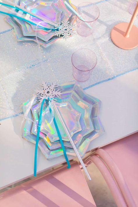 Snowflake iridescent Frozen birthday table decor for a DIY Frozen Birthday Party by Sugar & Cloth Frozen Birthday Table, Diy Frozen Birthday Party, Frozen Party Activities, Frozen Birthday Party Favors, Birthday Table Decor, Frozen Birthday Decorations, Frozen 3rd Birthday, Frozen Birthday Party Cake, Frozen Birthday Party Decorations