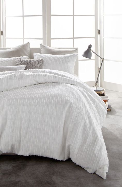 Free shipping and returns on DKNY Refresh Cotton Duvet Cover at Nordstrom.com. A tufted broken-stripe pattern adds textural contrast to the muted elegance of a sophisticated duvet cover woven from pure cotton. White Duvet Cover Bedroom, White Duvet Bedding, Cream And White Bedroom, Textured Duvet Cover, Textured Duvet, Modern Duvet Covers, White Comforter, White Duvet, Bedding Duvet