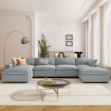 This 152.8" 6-seater down-cushioned sectional sofa is ideal for home entertaining spaces. Its unique U-shaped sectional design provides spacious and comfortable seating for family gatherings or relaxing. The sofa set is equipped with down-cushioned cushions. You bring excellent comfort, allowing you to relax and unwind. High-quality materials and exquisite craftsmanship ensure the durability and comfort of the sofa. Whether it is used in the living room, entertainment room or leisure room, this U-shaped sectional sofa All of them can create a comfortable and fashionable home environment for you. Specifications Material: Plywood+Solid wood+Plastic+Polyester+PP Cotton+Foam. Overall Dimension: 152.8"W x 70.9"D x 32.7"H. Seat Height: 20.9". Seat Width: 142". Seat Depth: 19.5". Arm Height: 25.5 U Shaped Couch, U Shaped Sectional Sofa, Couch With Ottoman, U Shaped Sofa, Grey Sectional, Sectional Sofa Set, U Shaped Sectional, Modular Sectional Sofa, The Embrace