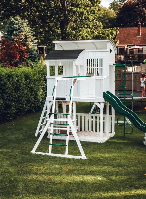 White Painted Playset | Nesting with Grace | After a year with a sealed cedar playset in our backyard, we decided to paint it with several coats of white paint! I love the new look! On the blog, I'm sharing how we spruced up our backyard and pressure washed our cedar fence. #backyard #playset #summerstyle Painted Playset, Playset Ideas, Backyard Updates, Garden Fence Paint, Lavender Meadow, Playhouse Makeover, Playroom Inspiration, Fence Backyard, Backyard Playset