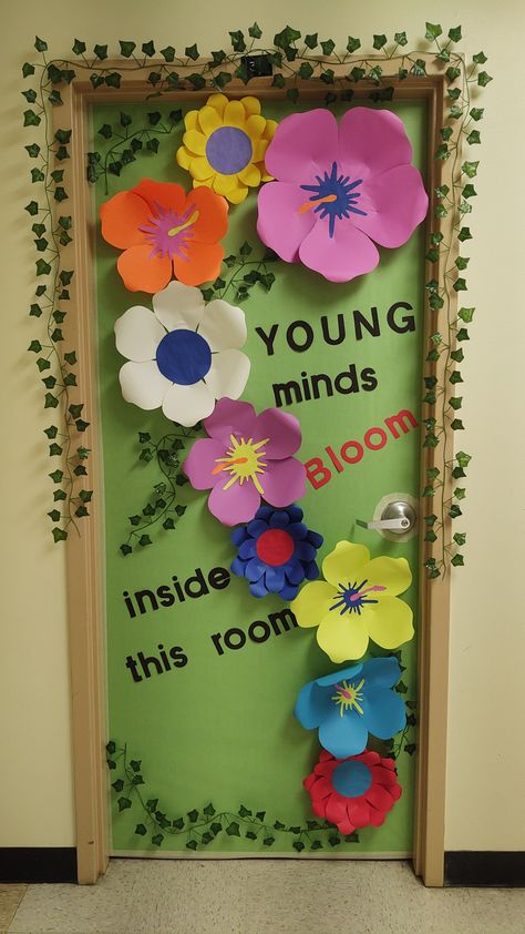 Garden Themed Classroom Door, Spring School Door Ideas, Nature Door Decorations Classroom, 1st Grade Classroom Door Ideas, Flower Door Decorations Classroom, Spring Door Classroom, May Door Decorations, April Door Ideas For Classroom, Spring Boards For Preschool