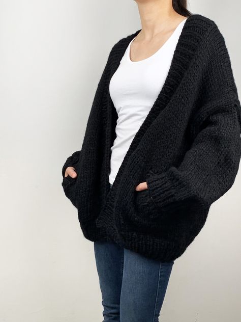 "New design for this winter! Oversize cardigan gives you cozy feel and stylelish looking! Feastures: * open front cardigan with side pockets * oversize looking * drop-shoulder sleeves * 70% wool / 30% acrylic chunky blended yarn - soft and no itchy at all Size: S(us 0-4) M(us 6-8) L(us 10-12)XL(14-16). Pls. choose size and color options. Size Measurements: S: chest 47\"(120cm), length -26\"(65cm) M: chest - 51\"(130cm) length - 27\" (68cm) L: chest 55\"(140cm), length- 28\"(70cm) XL: chest 59\"( Black Chunky Cardigan, Chunky Black Cardigan Outfit, Black Chunky Cardigan Outfit, Oversized Black Cardigan Outfit, Chunky Black Cardigan, Chunky Cardigan Outfit, Black Oversized Cardigan, Oversized Cardigan Outfit, Black Cardigan Outfit