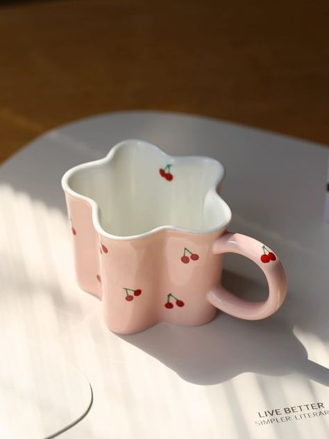 PRICES MAY VARY. Feminine and Stylish: Cherry Ceramic Coffee Mug is a must-have for those who appreciate a touch of cute aesthetic mugs in their daily routine. The lovely pink aesthetic and delicate cherry blossom design make it an eye-catching piece among the unique mugs in your collection. Perfect Size: Cute coffee mug, sized at 10 Oz, is perfect for your morning coffee or a soothing cup of tea. The handle provides a firm and comfortable grip, making it one of the finest and unique coffee mugs A Cup Of Tea Aesthetic, Aesthetic Mug Design, Cute Mugs Aesthetic, Cherry Ceramic, Coffee Mug Aesthetic, Pink Girly Aesthetic, Aesthetic Mugs, Pink Mugs, Flower Tea Cup