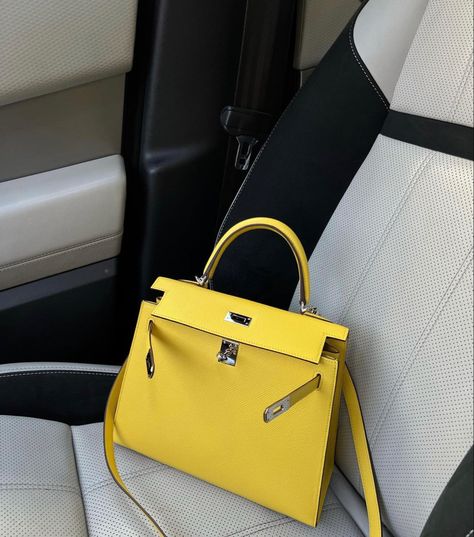 Selma Omari’s yellow kelly #kelly #yellow #yellowkelly #selmaomari #luxury #birkin #hermes #cars #luxurycars #luxe #lifestyle #luxurylifestyle Yellow Kelly Bag, Mini Kelly Hermes Outfit, Selma Omari, Berkin Bag, Hermes Yellow, Hermes Kelly 25, Birkin Hermes, Luxury Heels, Dream Bags