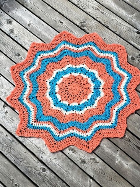 Advertisements Round Ripple Baby Afghan has a star-like mandala in the center and will look great in the modern nursery. You can create stripes of colour to make it more interesting or use ombre yarn for unexpected colour effects! This is a project for upper beginners who want to try... Crochet Star Blanket, Blanket Pattern Crochet, Star Baby Blanket, Awesome Crochet, Crochet Star, Ombre Yarn, Star Blanket, Baby Afghan, Reach For The Stars