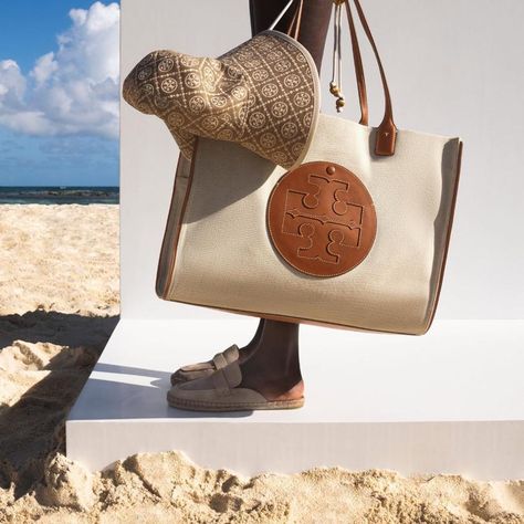 Shop the look on ModeSens! Tory Burch Ella Canvas Tote Bag In Natural / Classic Cuoio. Ready for a day by the water with our Ella Tote. A versatile essential. Super functional — sturdy and light, spacious and streamlined, with an oversized logo patch. #fashionfreedom #trend #casualchic #ss33 #toryburch Ella Tote, Tory Burch Ella, Shop The Look, Romper Pants, Canvas Tote Bag, Accessories Branding, Canvas Tote Bags, Tank Shirt, Daily Fashion