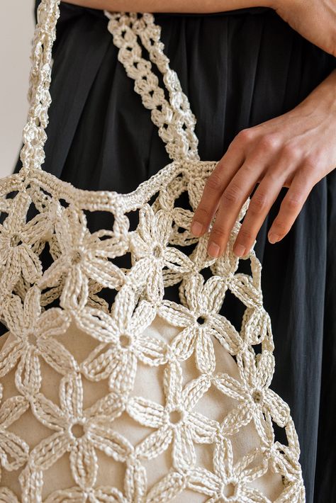 The Jasmine Raffia Tote — a design inspired by the delicacy of the jasmine blossom and the glistening waters of the Aegean Sea. Tote Crochet, Raffia Tote Bag, Crochet Raffia, Daisy Bags, Summer Tote Bag, Sea Bags, Summer Tote Bags, Crochet Handbag, Beige Bag