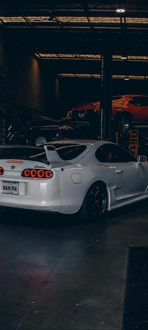 White supra aesthetic wallpaper Cars Aesthetic Supra, Car Bike Wallpaper, White Mk4 Supra, Supra Cars Wallpapers Aesthetic, Cars Wallpaper Supra, Supra Night Wallpaper, Toyota Supra Aesthetic Wallpaper, Supra Asthetic Picture, Supra Mk5 Wallpaper Aesthetic