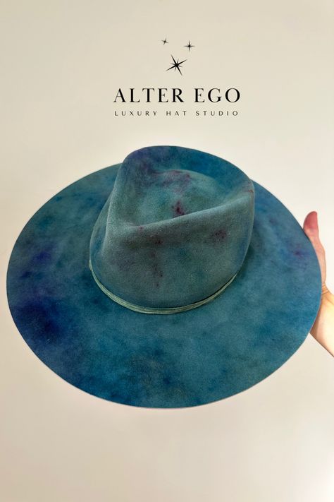 Expertly hand crafted. Hand dyed, one of a kind incredible wide brim fedora hat just in time for hat season. Rich jewel tones, fall colors, and a perfect fit. Stand out and be special this gorgeous custom hat. Teresa Foglia Hats, Painted Wide Brim Hat, Blue Fedora Hat Outfit, Florence Core, Wide Brim Fedora Women, Hat Design Ideas, Fall Hats For Women, Cowboy Hat Crafts, Fedora Hat Outfits