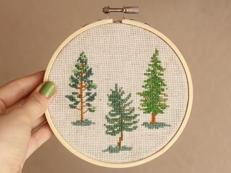 cross stitch hoop art fir-tree, pine forest                                                                                                                                                                                 More Cross Stitch Pine Tree, Pine Tree Cross Stitch, Cross Stitch Trees, Cross Stitch Forest, Forest Cross Stitch Pattern, Forest Cross Stitch, Tree Cross Stitch Pattern, Tree Cross Stitch, Cross Stitch Hoop