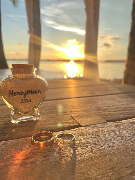 Honeymoon / Sunset at the beach / Wedding rings Beach Photography Couples Honeymoon Pictures, Honeymoon Beach Photos, Cruise Honeymoon Aesthetic, Beach Honeymoon Pictures, Beach Honeymoon Aesthetic, Honeymoon Picture Ideas, Honeymoon Beach Outfits, Honeymoon Couple Pictures, Honeymoon Beach Pictures