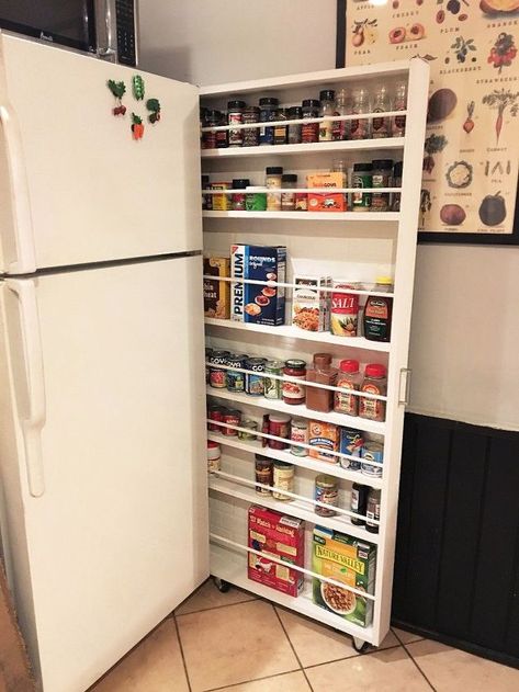 Give that space between your fridge and the wall a whole new purpose with this great storage cabinet hack. DIY hidden storage for your canned food! If you're short on space, it pulls out for easy access to whatever you need to store. diy | woodworking | storage cabinet | storage ideas, urban living, woodworking projects, Pulls out for easy access to canned goods etc Small Home Improvements, Food Storage Cabinet, Storage Hacks Diy, Diy Rangement, Kitchens Ideas Remodeling, Canned Food Storage, Kitchen Storage Space, Woodworking Storage, Small Kitchen Organization