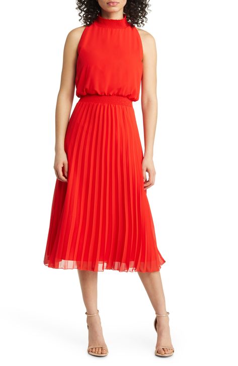 An accordion-pleat skirt lends graceful movement to this sleeveless midi designed with a smocked neckline and waist. 47" length (size 8) Mock neck Sleeveless Lined 100% polyester Machine wash, tumble dry Imported Coral Skirt Outfit, Dresses For Women Over 50, Best Cocktail Dresses, Mesh Cocktail Dress, Cocktail Dresses For Women, Cocktail Dress Style, Coral Skirt, Long Sleeve Chiffon Dress, Fitted Sheath Dress